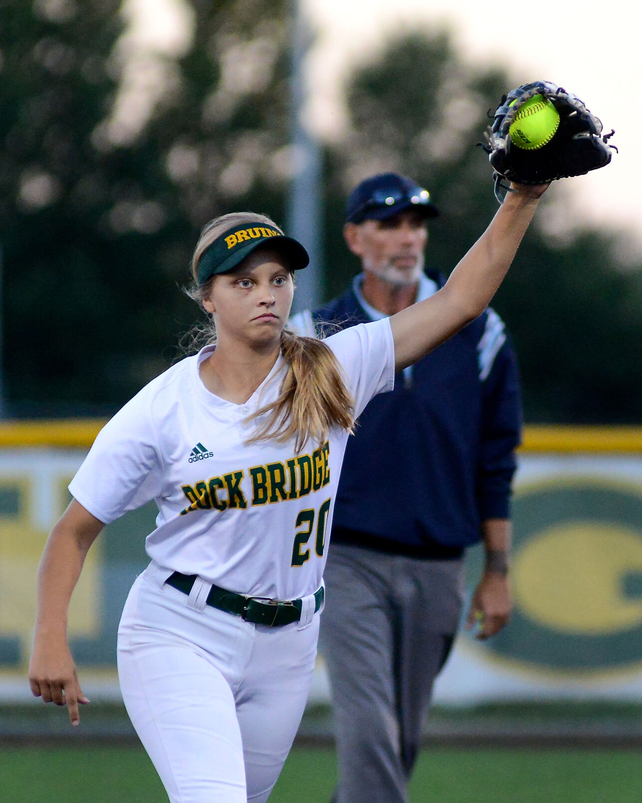 Sophie Schupp holds the ball in her mitt after making the last play of the game between the Bruins and Kewpies